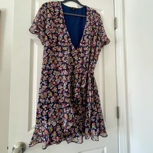 Floral wrap dress with flutter sleeve and ruffle detail